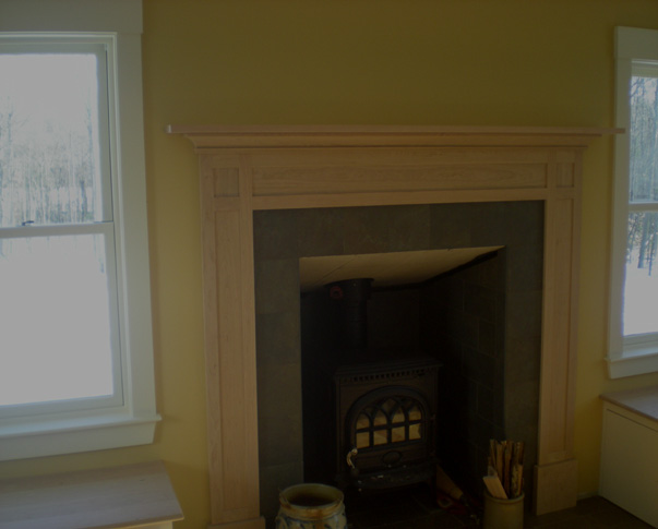 Treehouse Woodworking raised_panel_fireplace_wall1.jpg